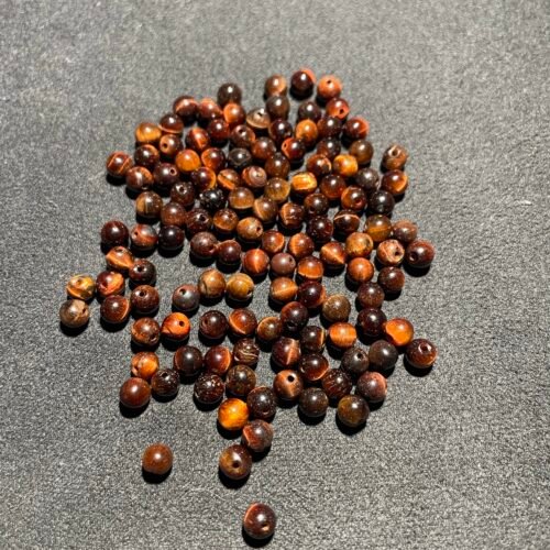 Perle 4 mm Œil de Taureau Traité d Afrique du Sud